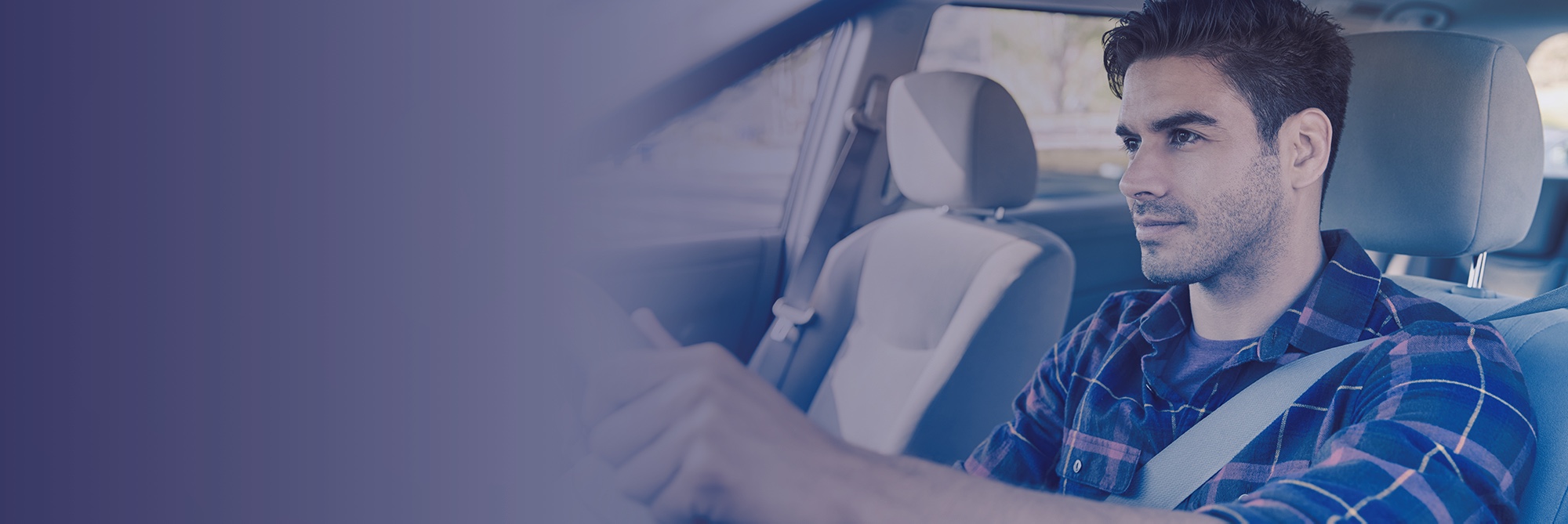 Young man with Low Myopia driving without glasses