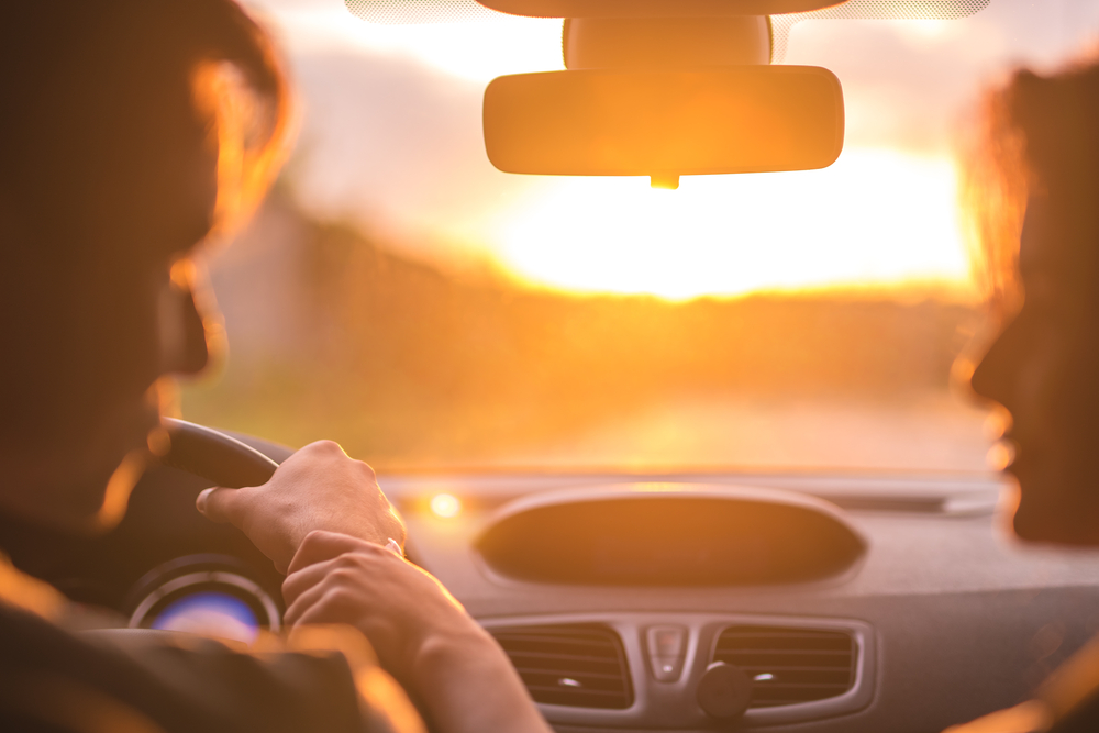 man after cataract surgery and woman drive a car