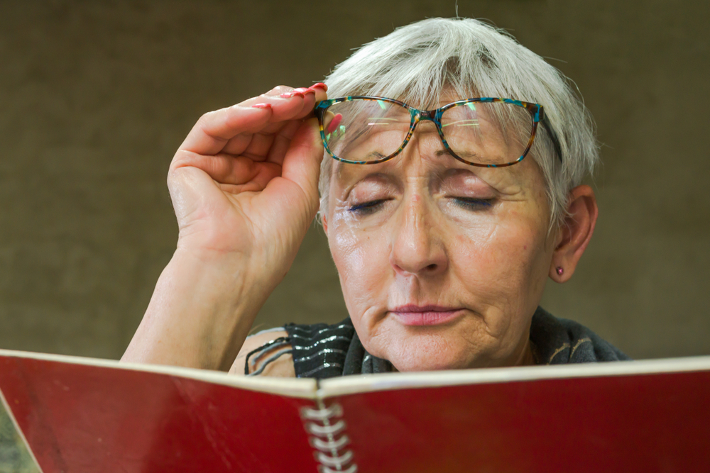 older woman with reading problems