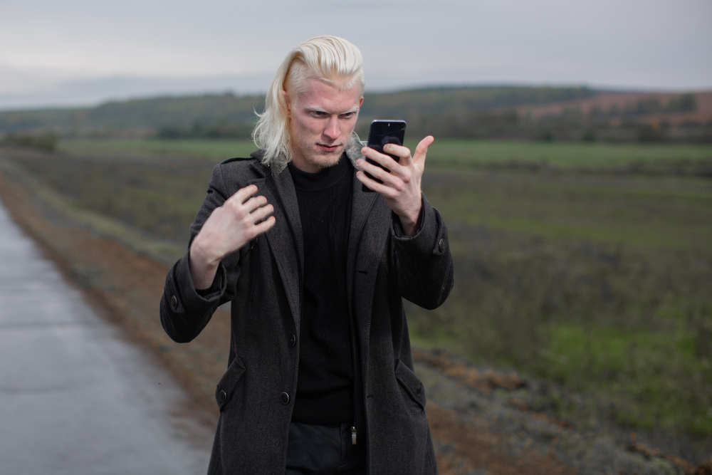 Albino man make self photo