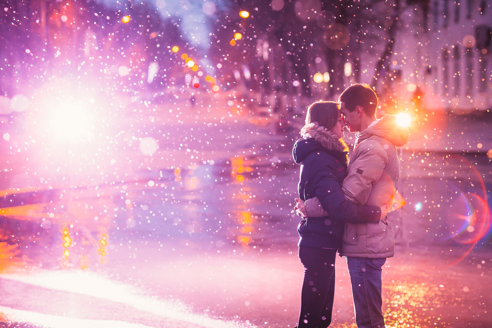 love couple at night city street with light flashing